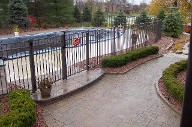 Boulder Retaining Wall, Interlocking Paver Patio, Drainage System