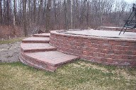 Symetry Interlocking Pavers, Raised Patio, Retaining Wall