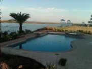 Galveston Island Texas Pool Decking Belgard Cambridge Collection Brick Pavers Drainage Retaining Wall Walkway Landscaping Fire Pit