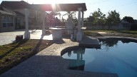 League City Texas Pool Decking Belgard Cambridge LCollection Brick Pavers Drainage Retaining Wall Walkway Landscaping Fire Pit