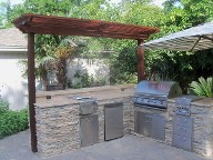 Houston, Texas outdoor kitchen, Brick Paver Patio, Retaining Wall, Drainage System, Fire Pit, Pergola