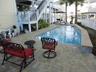 Galveston Pool Deck Belgard Cobble Stone Brick Pavers Landscaping Retaining Wall Fence