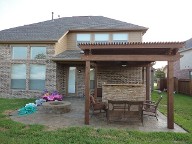 Pearland, Texas Pergola Brick Pavers Decking Drainage System Landscaping Outdoor Kitchen Lighting Fire Pit