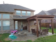 Pearland, Texas Pergola Brick Pavers Decking Drainage System Landscaping Outdoor Kitchen Lighting Fire Pit