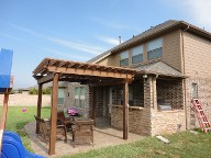 Pearland, Texas Pergola Brick Pavers Decking Drainage System Landscaping Outdoor Kitchen Lighting Fire Pit