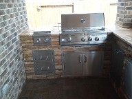 League City, Texas outdoor kitchen, Brick Paver Patio, Retaining Wall, Drainage System, Fire Pit, Pergola