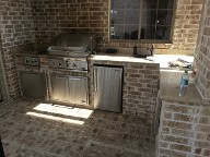 League City, Texas outdoor kitchen, Brick Paver Patio, Retaining Wall, Drainage System