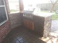 Pearland, Texas outdoor kitchen, Brick Paver Patio, Retaining Wall, Drainage System
