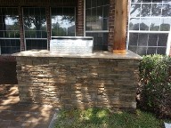Pearland, Texas outdoor kitchen, Brick Paver Patio, Retaining Wall, Drainage System