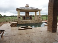 Pearland, Texas Retaining Wall, Step System, Travertine Pool Decking, Drainage System, Fire Pit, Fire Place