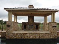 Pearland, Texas Retaining Wall, Step System, Travertine Pool Decking, Drainage System, Fire Pit, Fire Place