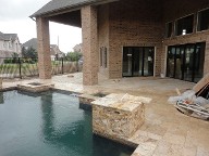 Pearland, Texas Retaining Wall, Step System, Travertine Pool Decking, Drainage System, Fire Pit, Fire Place