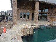 Pearland, Texas Retaining Wall, Step System, Travertine Pool Decking, Drainage System, Fire Pit, Fire Place