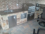 Pearland, Texas Outdoor Kitchen Retaining Wall, Step System, Brick Paver Patio, Drainage System, Fire Pit, Fire Place